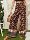 Women Floral Printed High-Rise Loose Fit Wide Leg Trousers