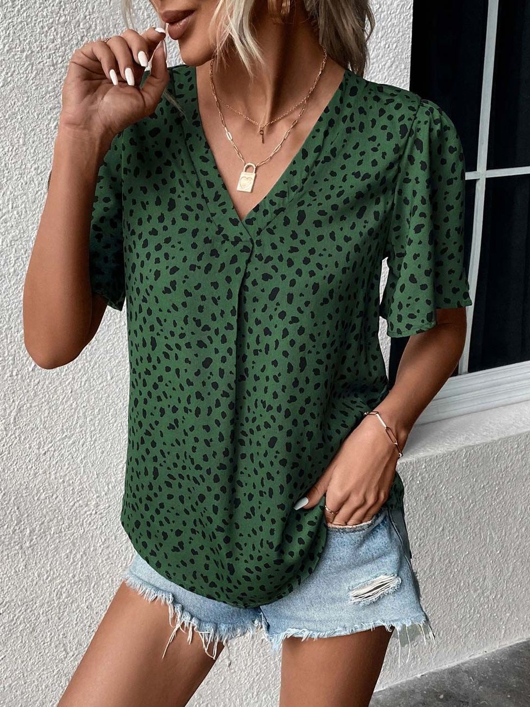 NOWI Animal Print Flared Sleeve Top