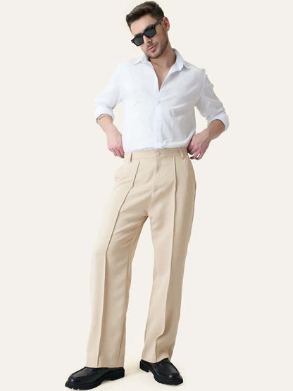 Men Pleated Trousers in beige, relaxed fit korean pants worn by a male model, styled with a white shirt.