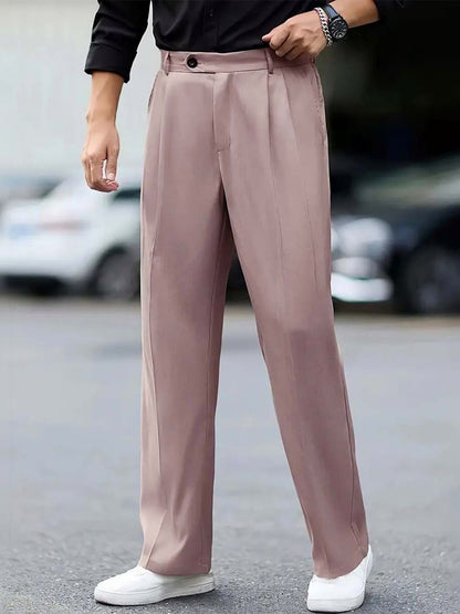 Men Pleated Trousers in relaxed fit, solid pink color, perfect korean pants for stylish male outfits.