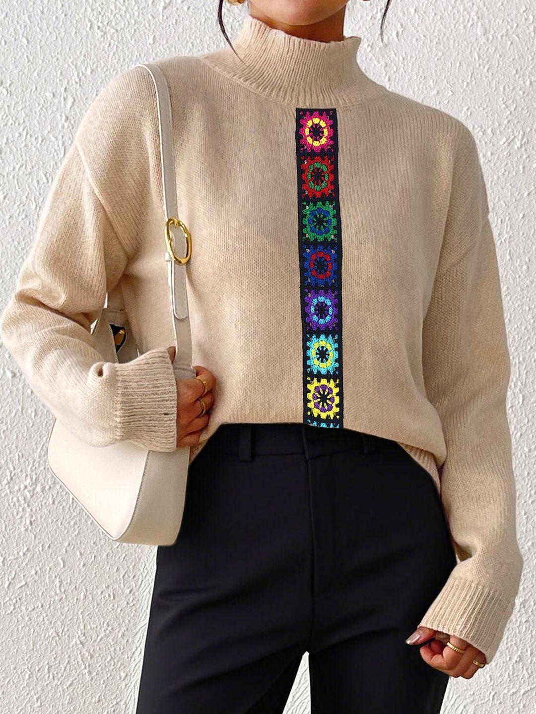 Women Colourblocked Pullover with Embroidered Detail