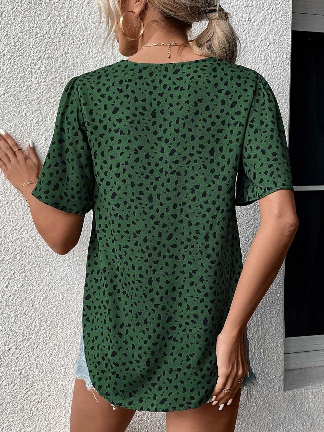 NOWI Animal Print Flared Sleeve Top