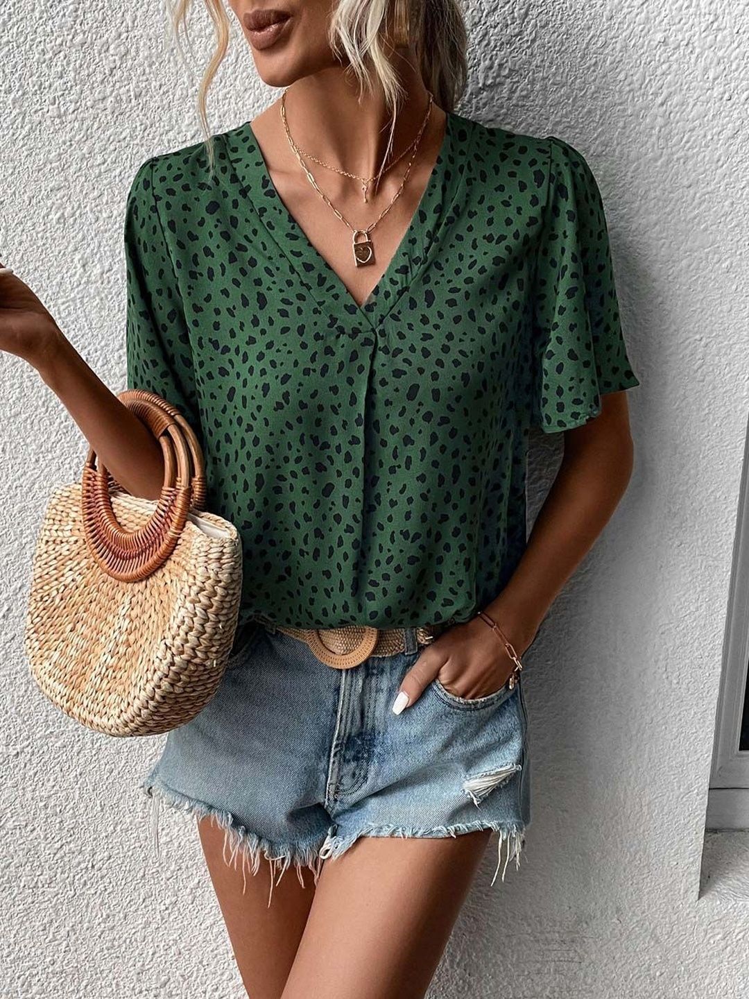 NOWI Animal Print Flared Sleeve Top