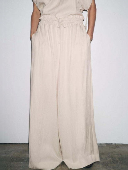 Trousers in Beige lycra - Nowi Korean Fashion