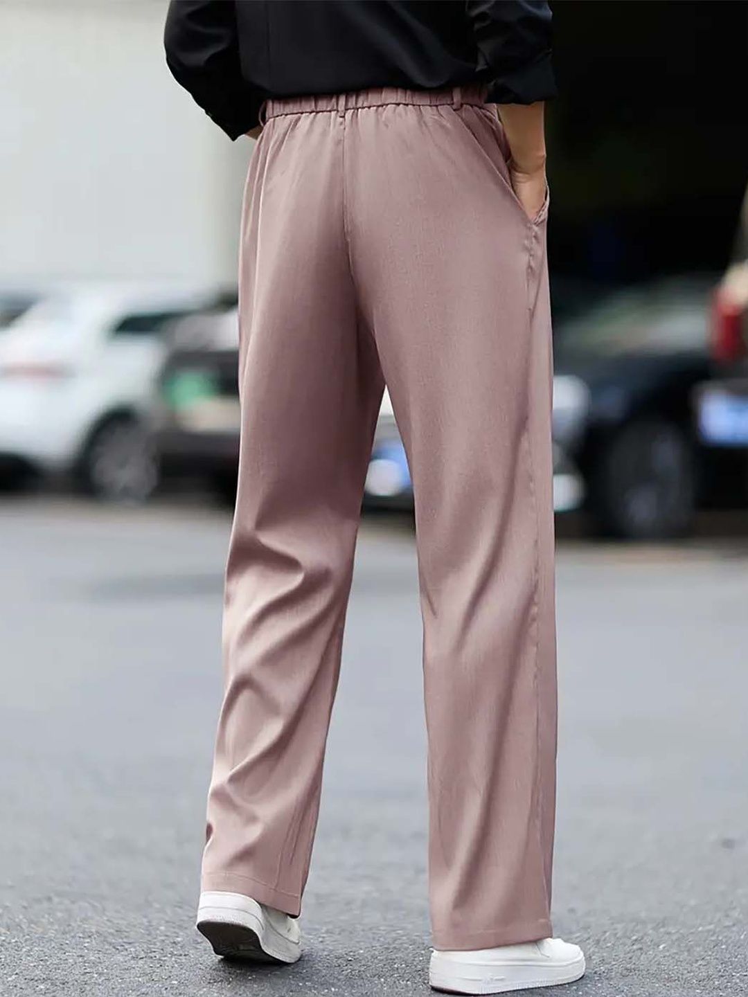 Men Pleated Trousers in pink, relaxed fit korean pants with a solid pattern, showcasing the back view.