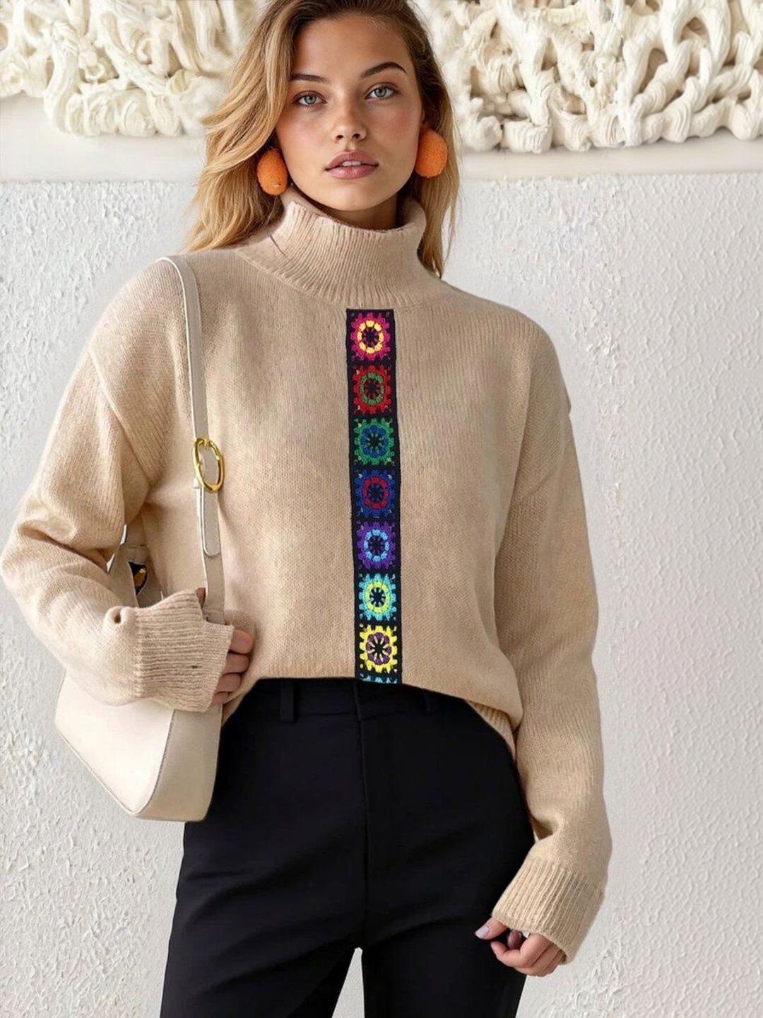 Women Colourblocked Pullover with Embroidered Detail