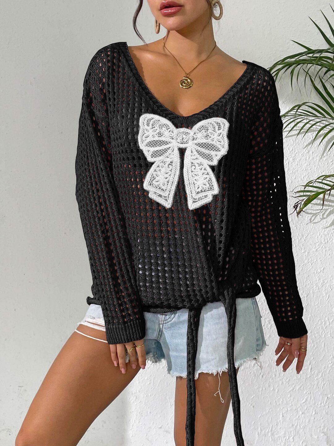 Women Pullover with Applique Detail