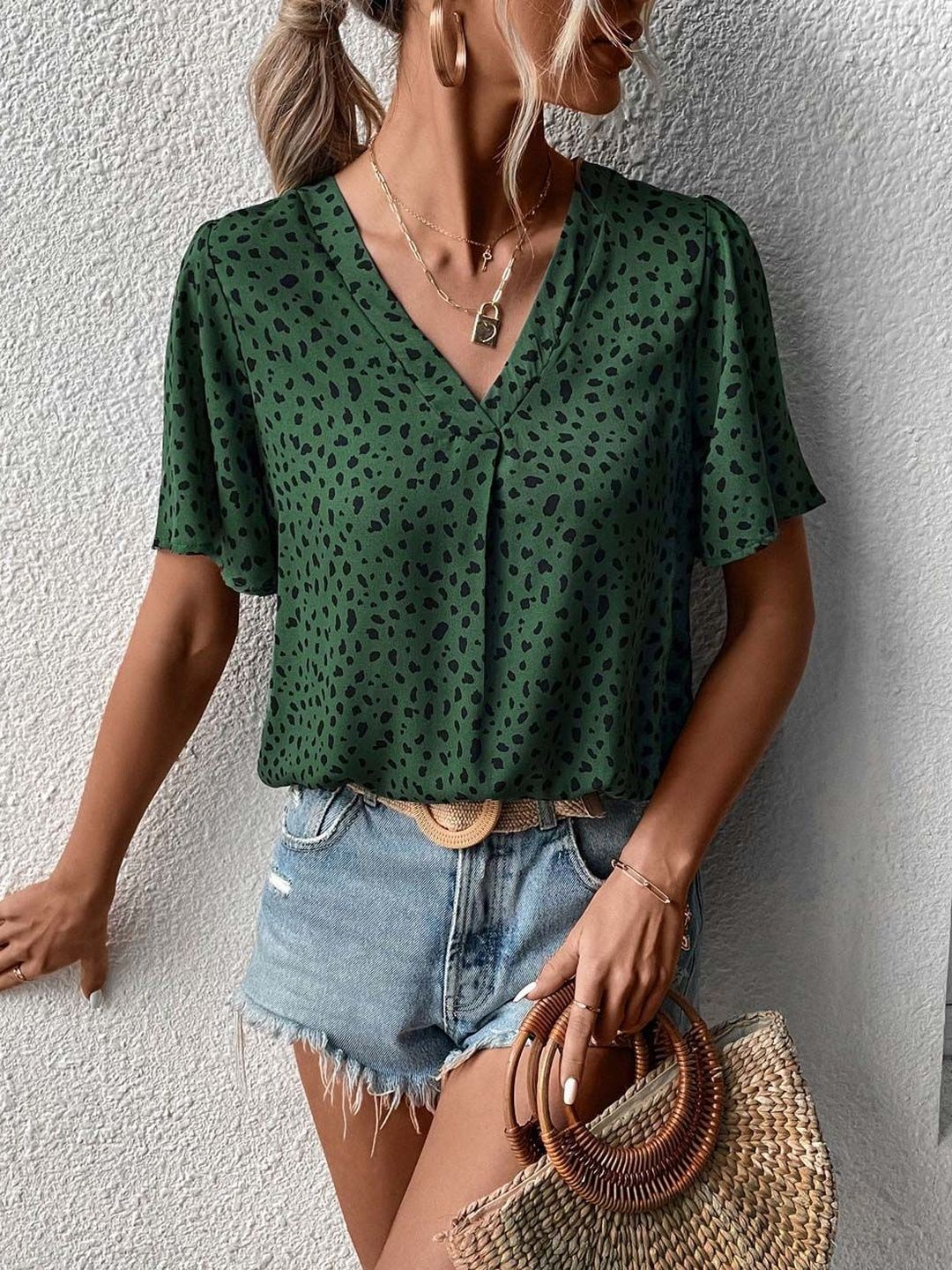 NOWI Animal Print Flared Sleeve Top